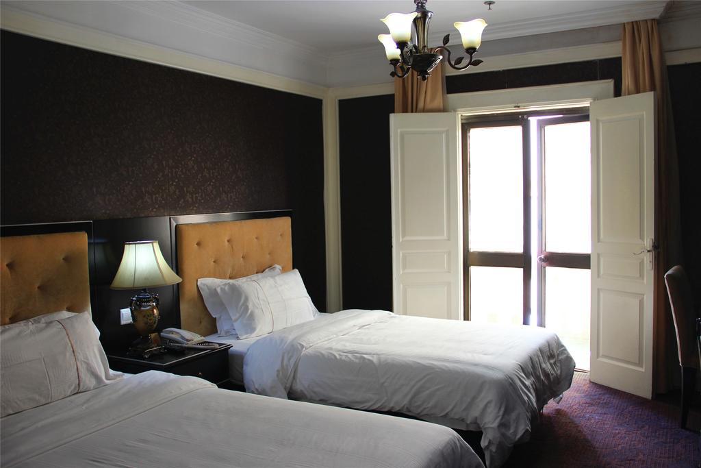 Manhattan Jinling Hotel Shanghai Rom bilde